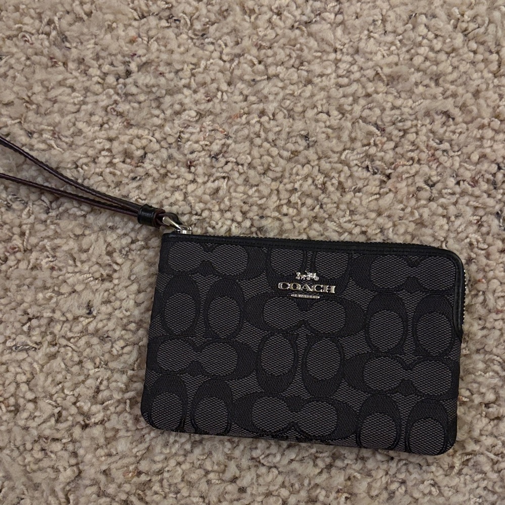Coach like new Black Signature Wristlet